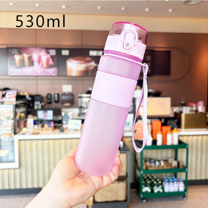 Ladies practical and leak-proof drinking bottle with integrated carrying strap Bowlift