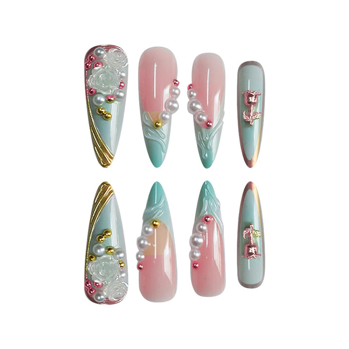 Luxurious Stiletto Nail Enhancements with Floral Accents Bowlift