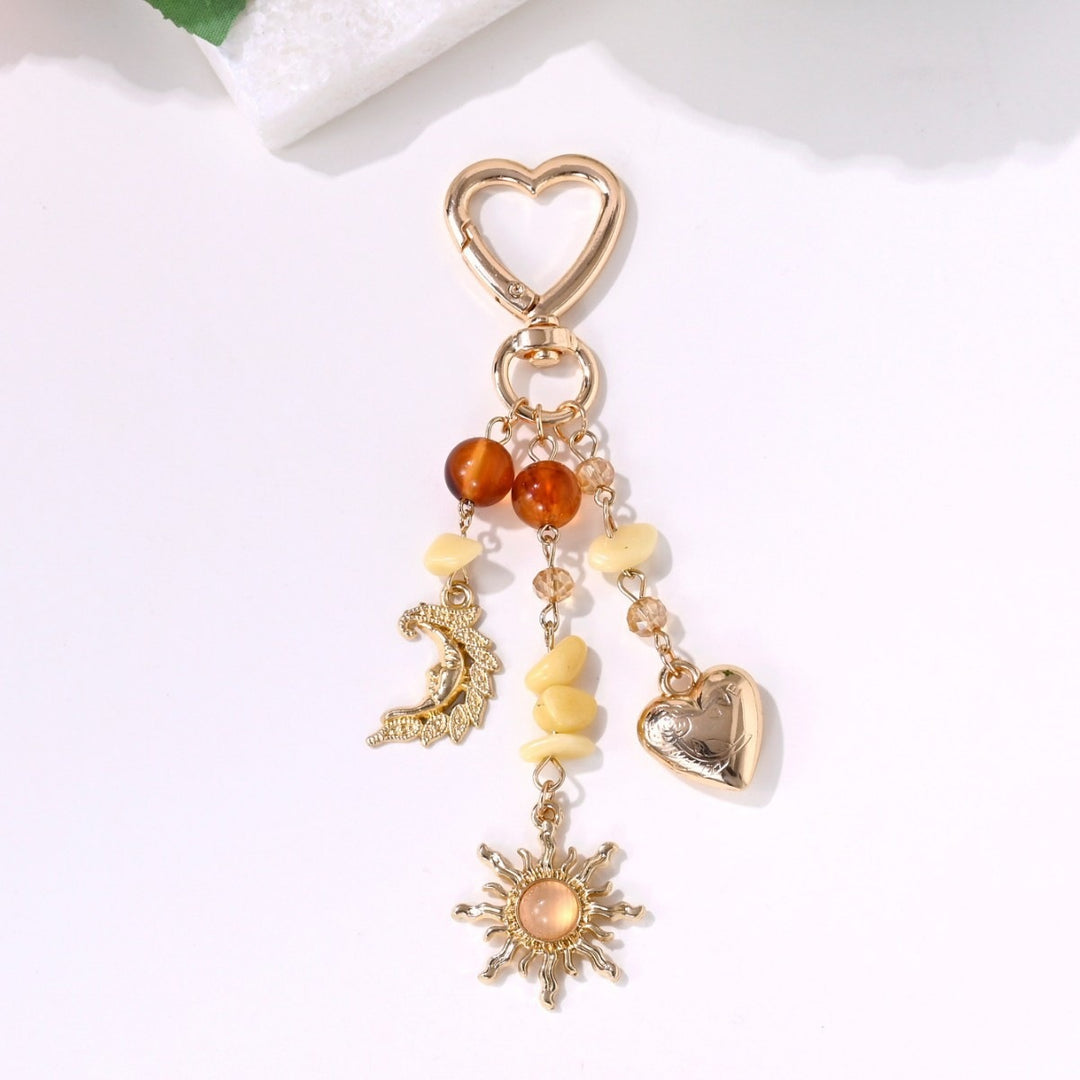 Keychain with Sparkling Sun Motif Bowlift