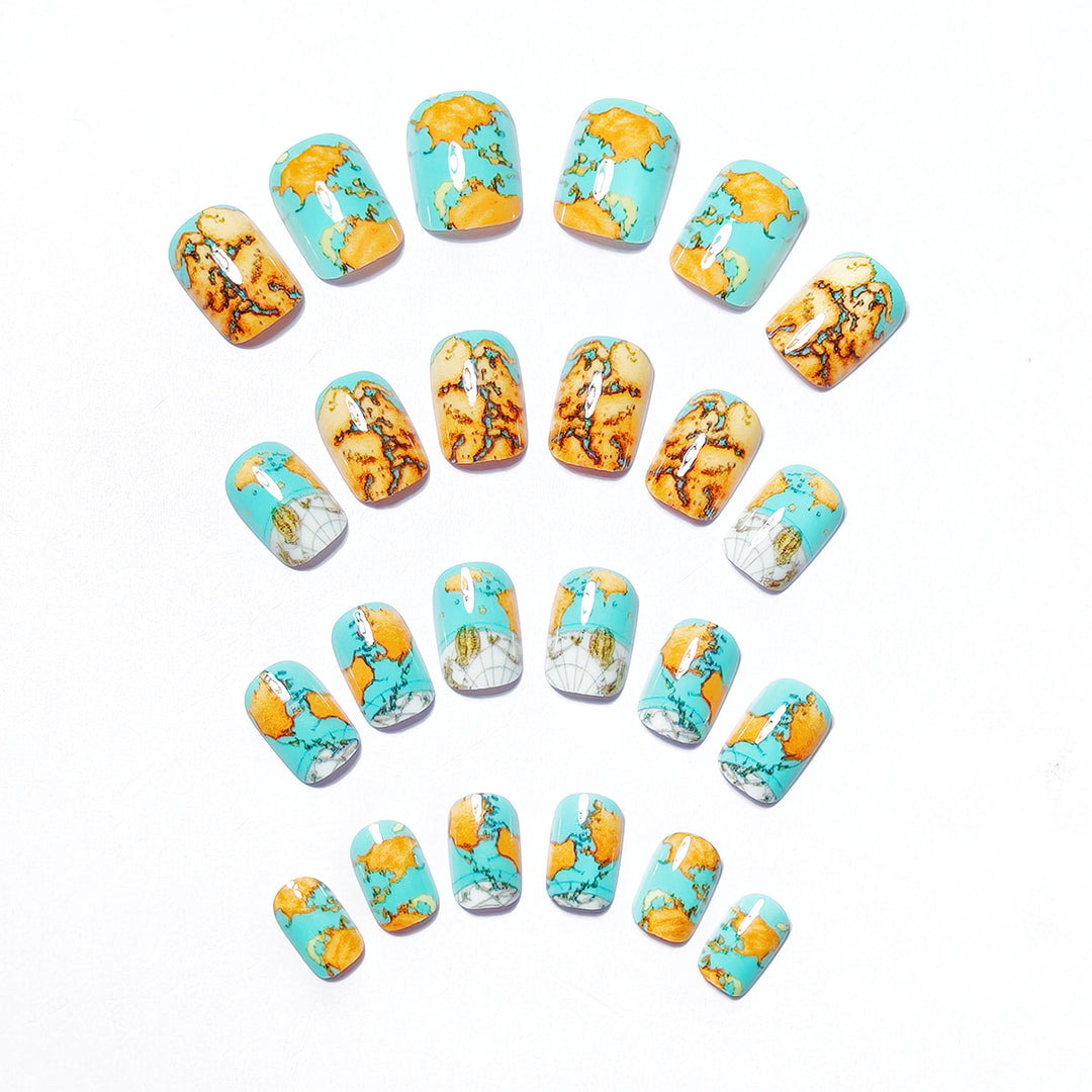 Creative artificial nails with world map inspired design Bowlift