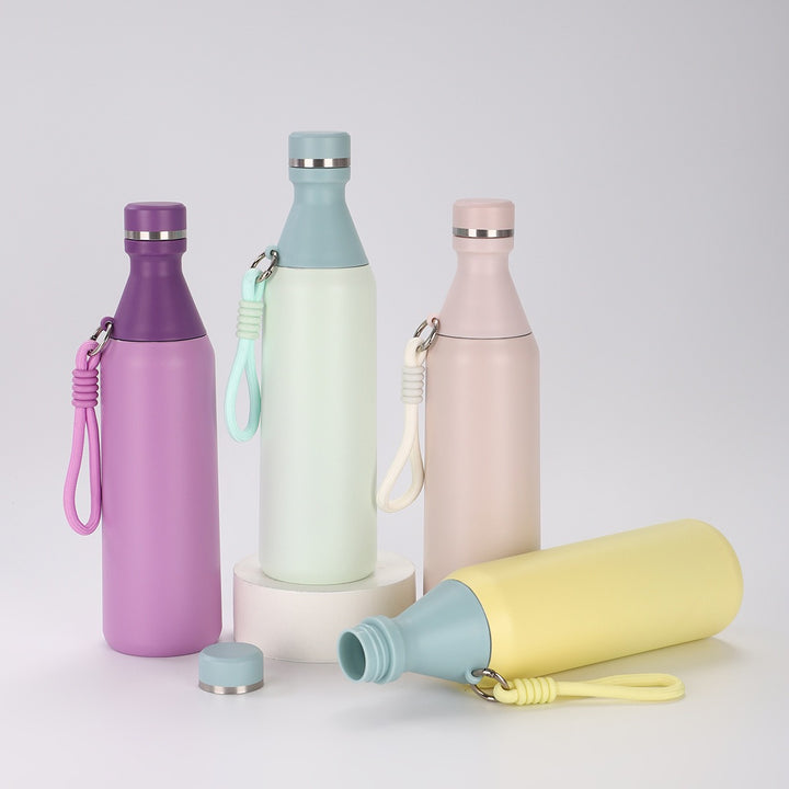 Ladies insulated drinking bottle with practical carrying strap Bowlift