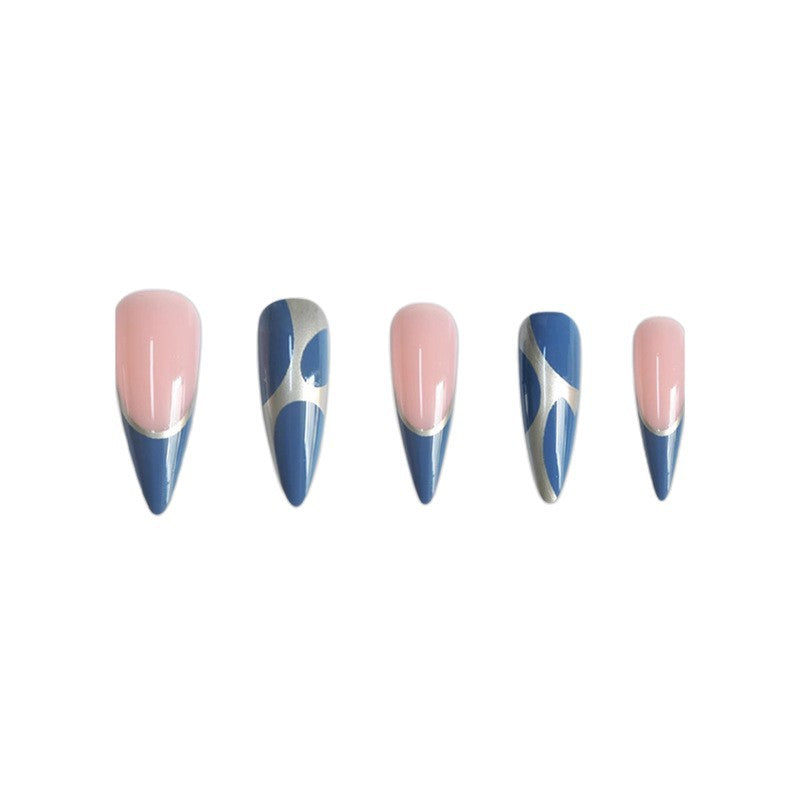 Artistic Stiletto Press-On Nail Design with Metallic Trim Bowlift