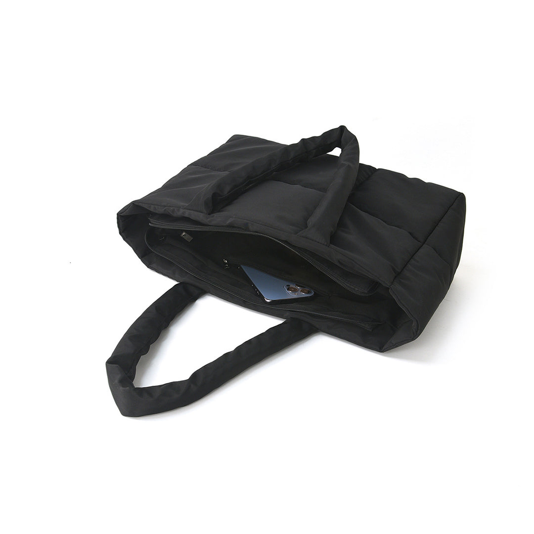Padded carrying bag with modern quilted design Bowlift