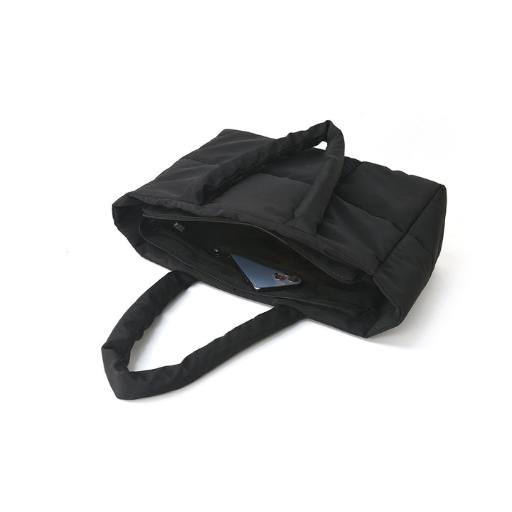 Padded carrying bag with modern quilted design Bowlift