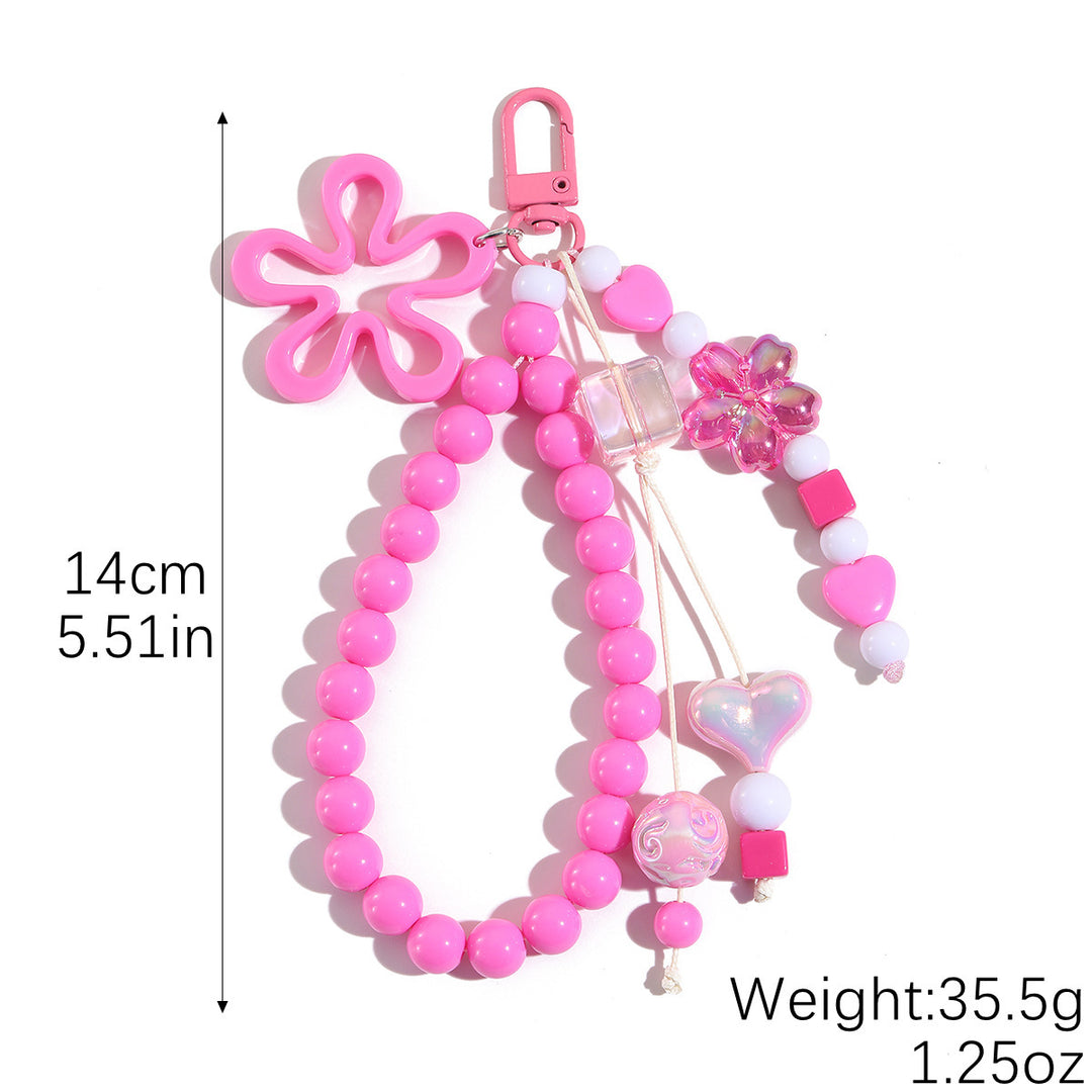 Playful keychain with flower and butterfly details Bowlift