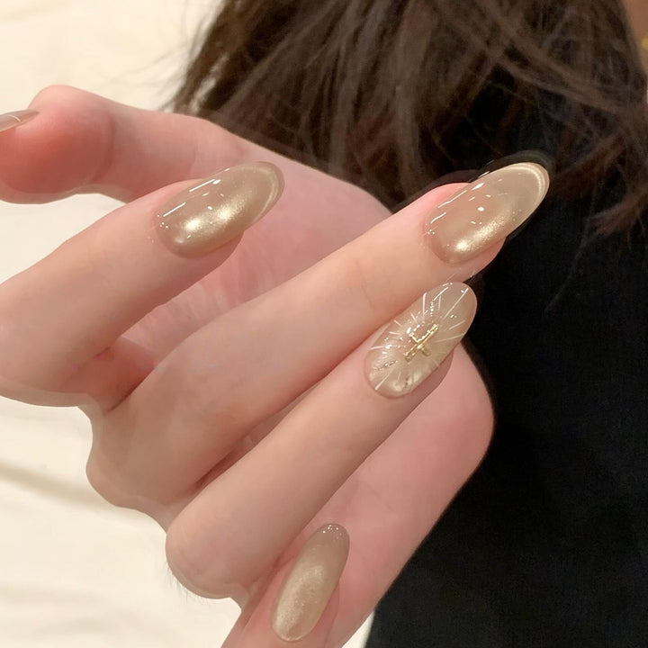 High-gloss artificial nails with filigree accents Bowlift