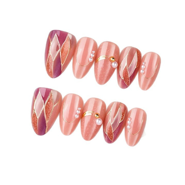 Artificial nails with elegant pearl and gold accents Bowlift