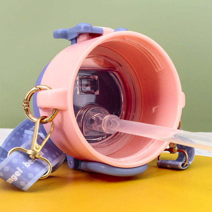 Insulated drinking bottle with practical carrying strap and playful design Bowlift