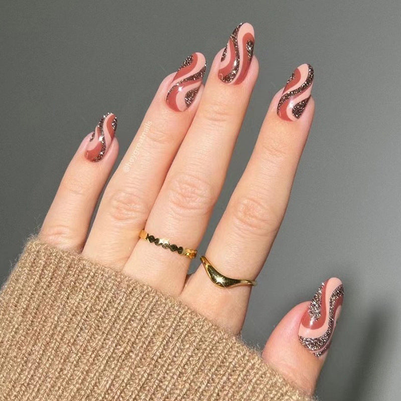Artful nail extensions with an elegant leaf pattern Bowlift