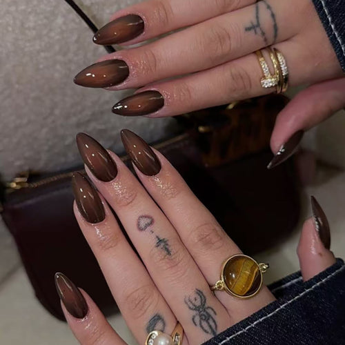 Artistic Stiletto Nails with Glossy Finish Bowlift