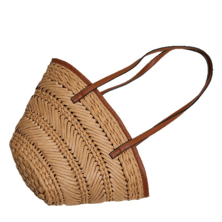 Braided basket bag with innovative leather handles Bowlift