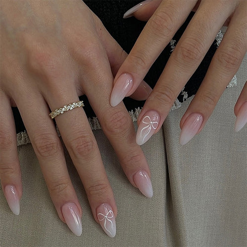 Artificial nail set with elegant designs and subtle accents Bowlift