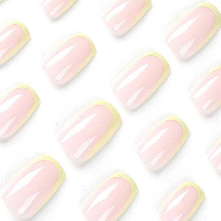 Artistic nail extensions with elegant French tip and modern accents Bowlift