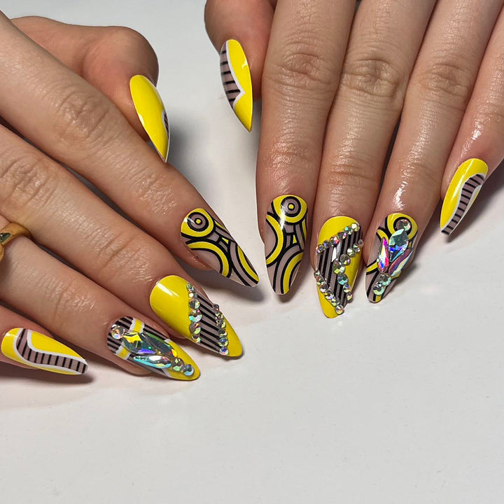 Artful nail extensions with geometric design and glitter accents Bowlift