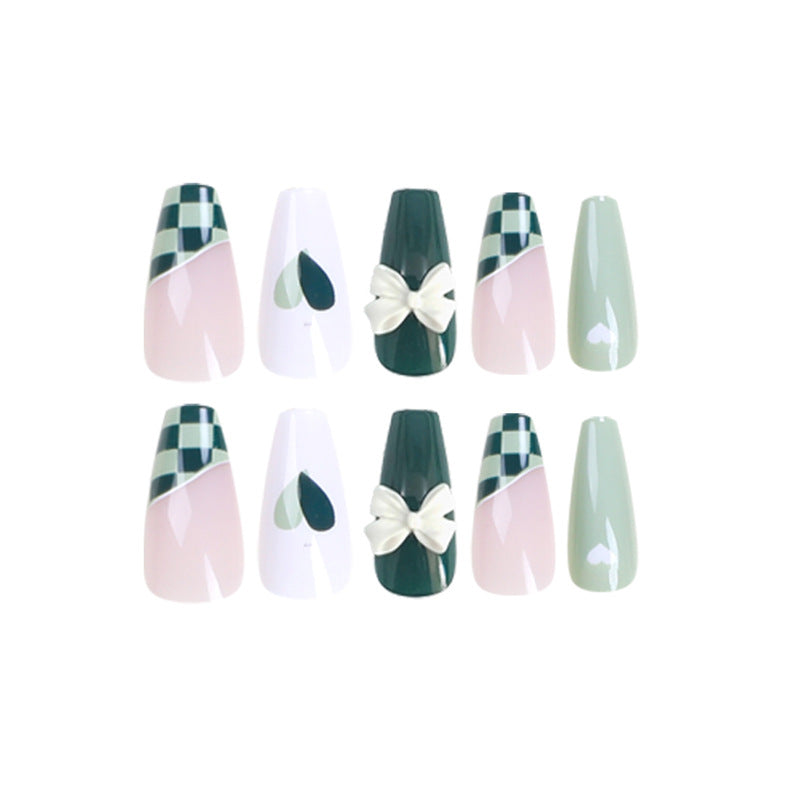 Artificial nail extensions with creative design and glitter accents Bowlift