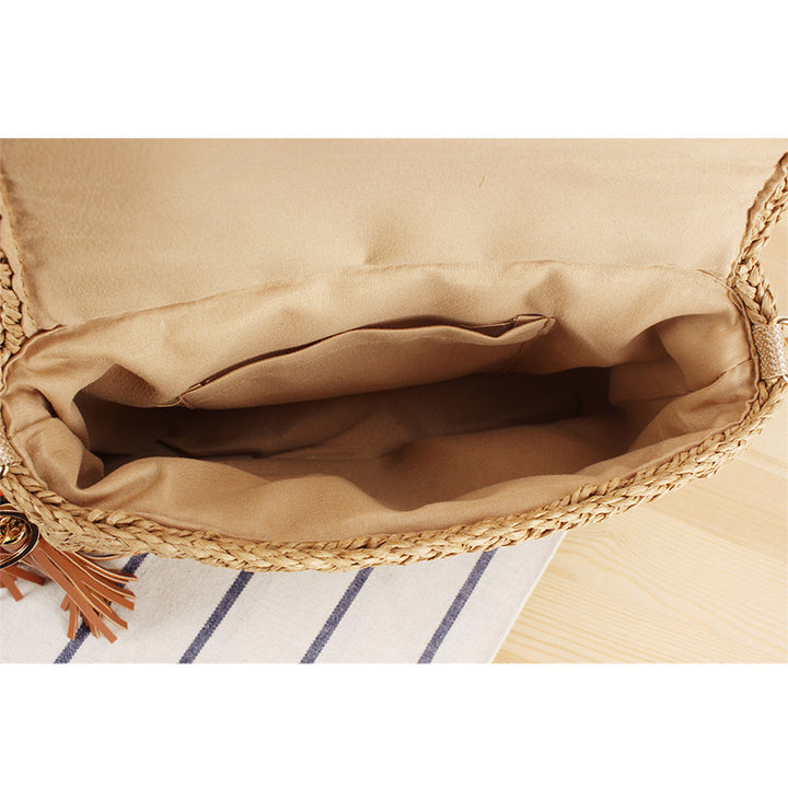 Shoulder bag made of hand-knotted natural material with decorative macramé elements Bowlift