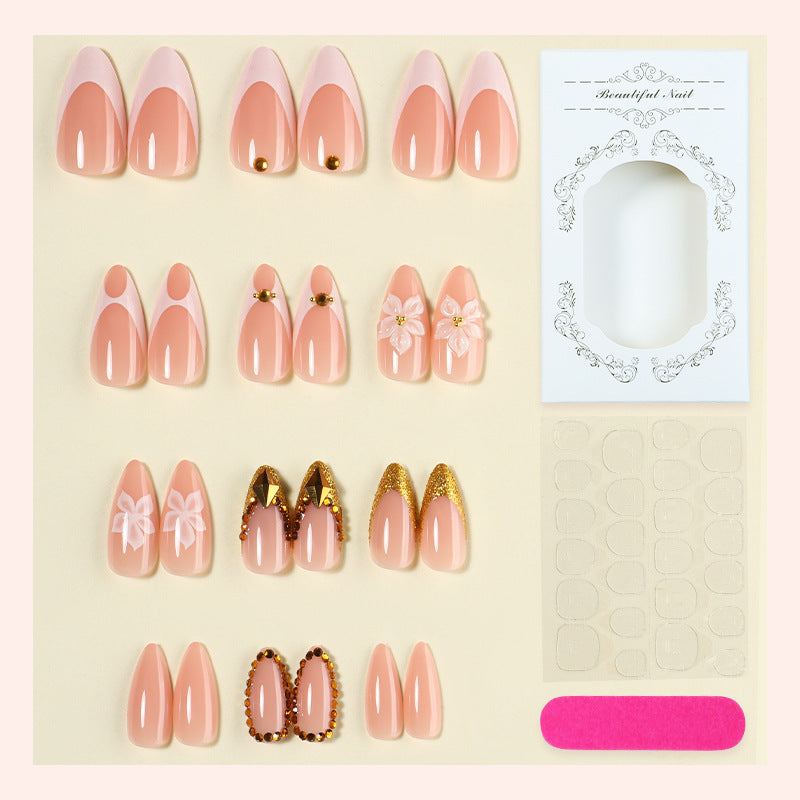 Artificial nail set with elegant flower and gold accents Bowlift