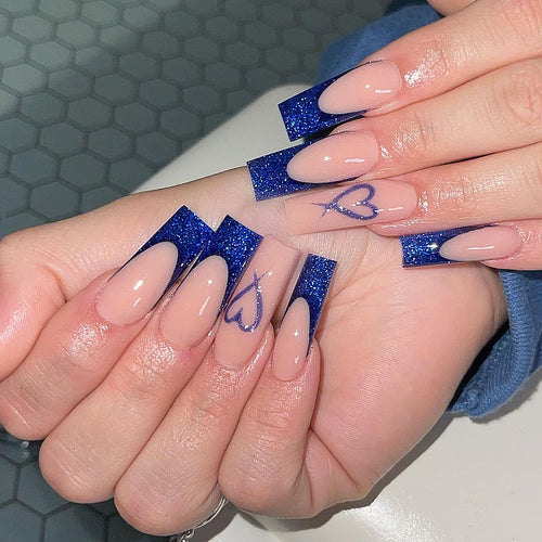 Artificial nails with glitter accents and unique heart design Bowlift