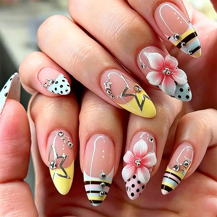Elegant artificial nails with hand-painted floral accents Bowlift