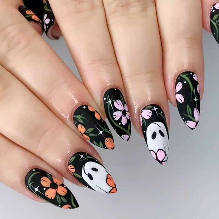 Artificial nail set with floral and spooky designs Bowlift