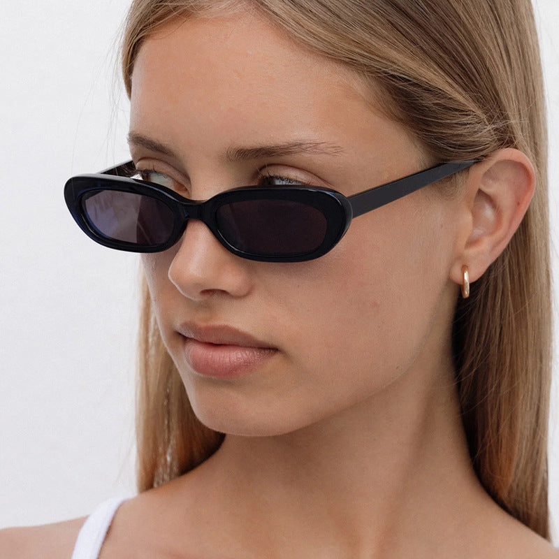 Women's trendy cat-eye sunglasses with transparent plastic frame and UV protection Bowlift