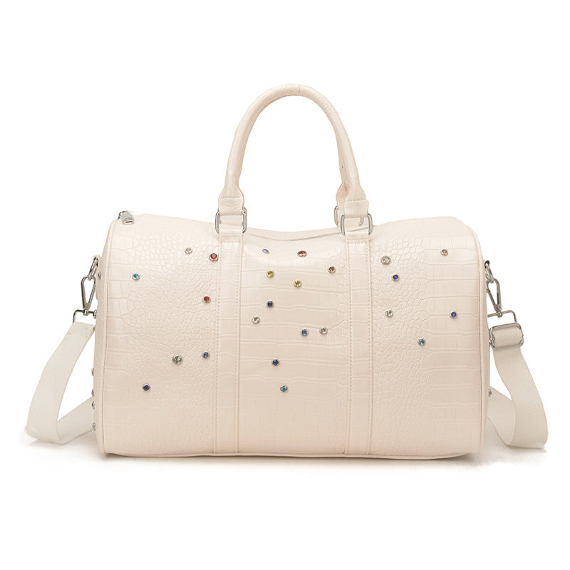 Fashionable travel bag with structured surface and versatile interior Bowlift