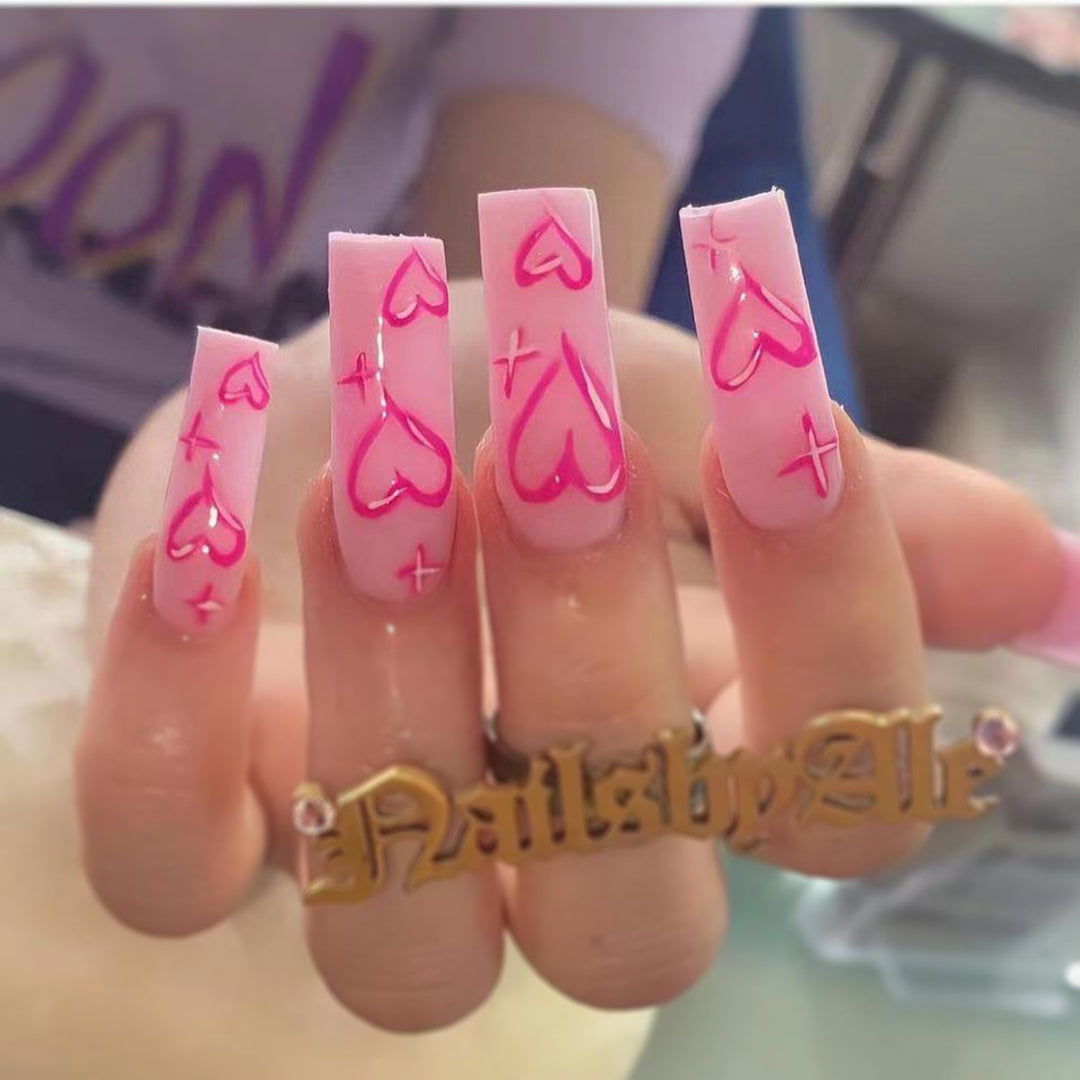 Artistic acrylic nails with heart design Bowlift