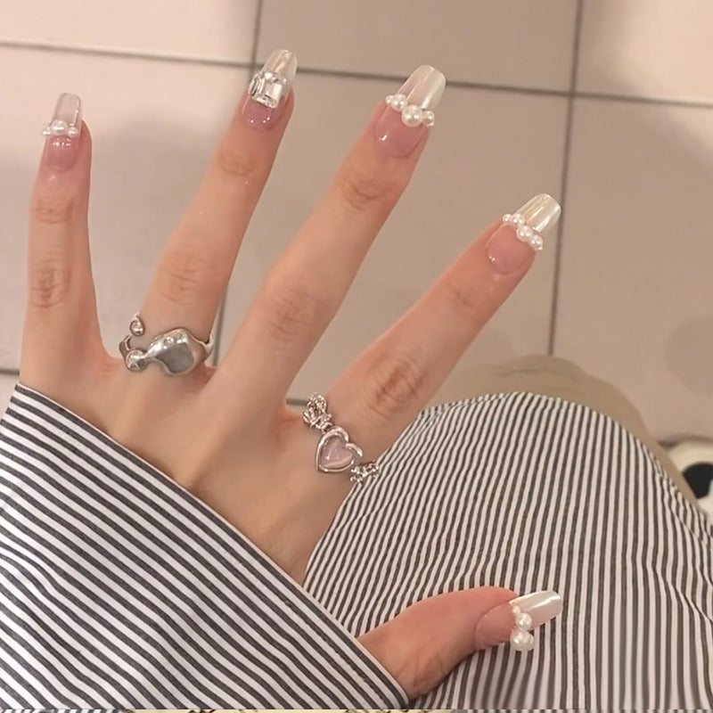 Elegant Press-On Nail Art with Pearl and Rhinestone Accents Bowlift