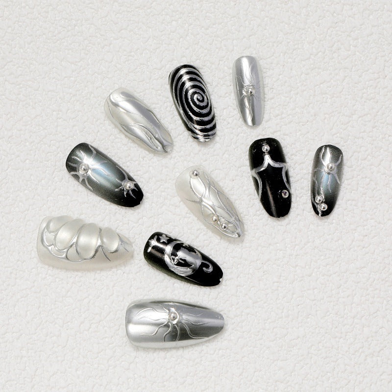 Artificial nails with metallic effects and complex designs Bowlift
