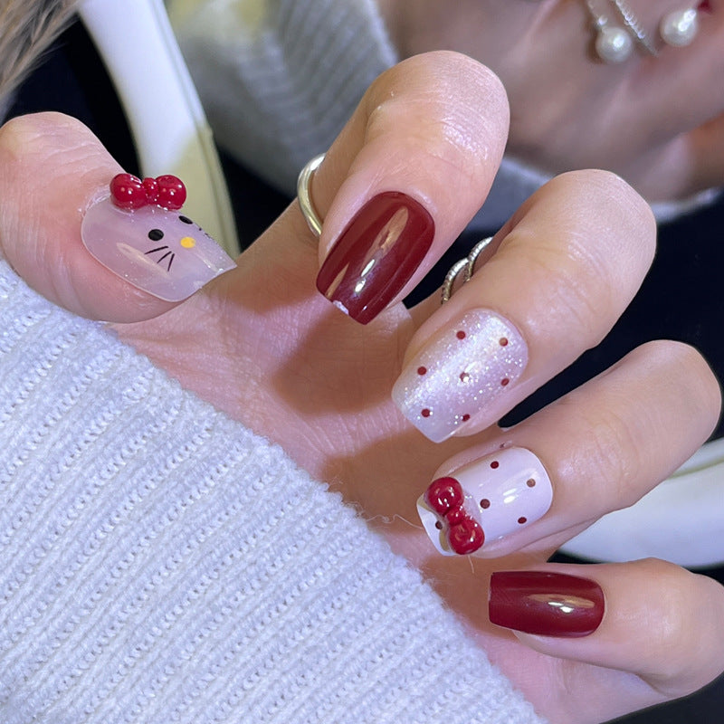 Glamorous Press-On Nail Set with Decorative Gemstone Accents Bowlift