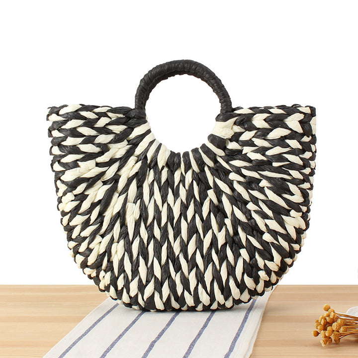 Wicker bag in modern design with artistic weaving Bowlift