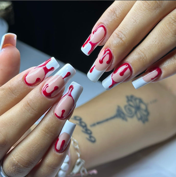 Artistic Press-On Nail Design with Dripping Effect Bowlift