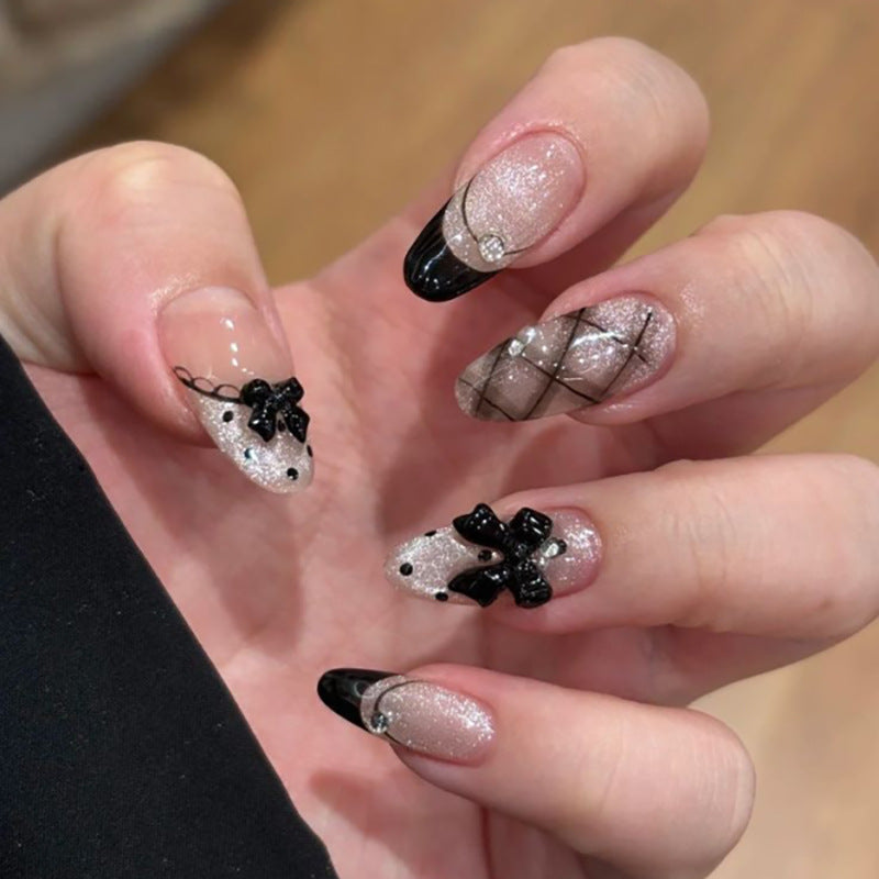 Artful acrylic nails with elegant floral accents Bowlift