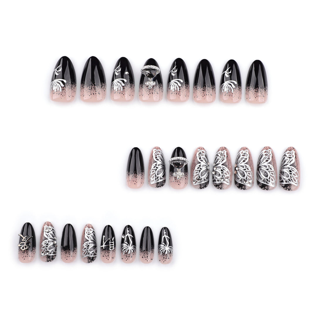 Artful stiletto nails with delicate embellishments and glamour accents Bowlift