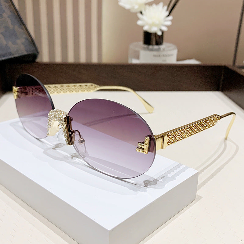 Women's sunglasses with glittering frame and oval lenses Bowlift