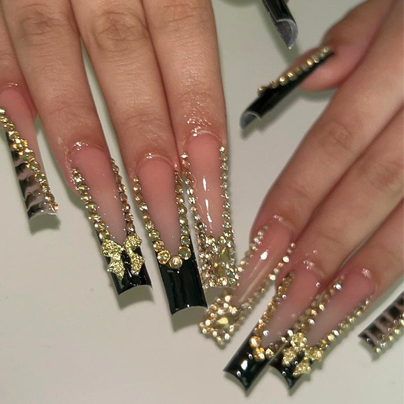 Acrylic nail set with glamorous 3D bows and radiant rhinestone decorations Bowlift