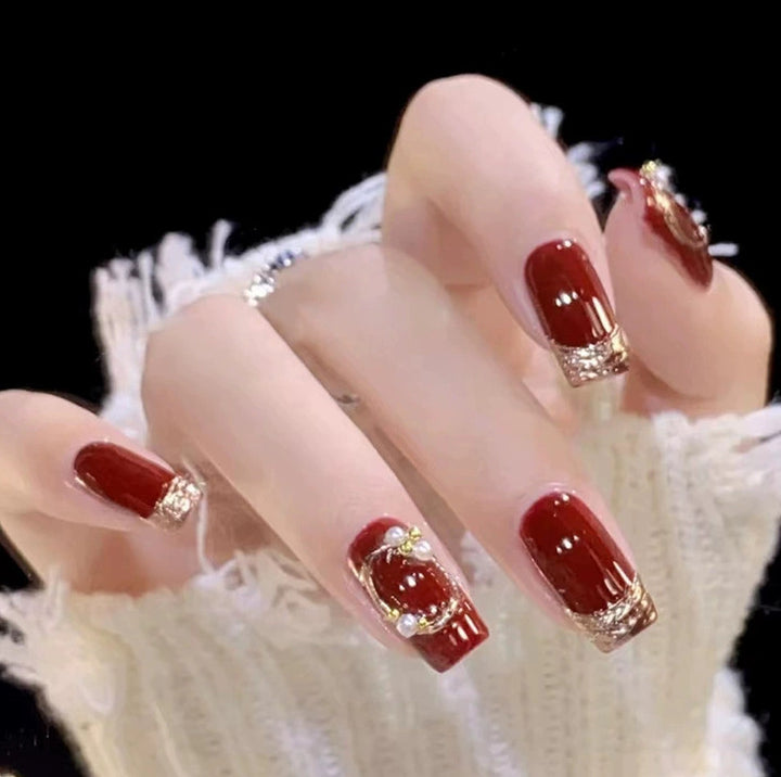 Elegant nail design with pearl embellishment Bowlift