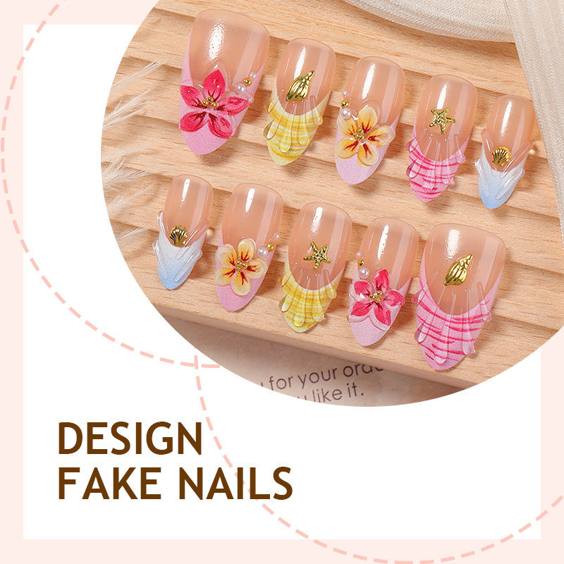 Artificial nail set with floral patterns and sparkling accents Bowlift