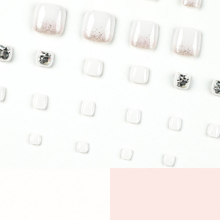 Artful toenail design with sparkling embellishments Bowlift