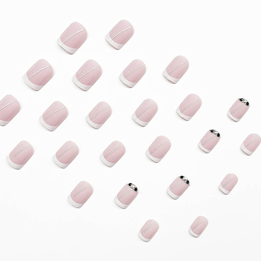 Art nail set with elegant French design and glittering accents Bowlift