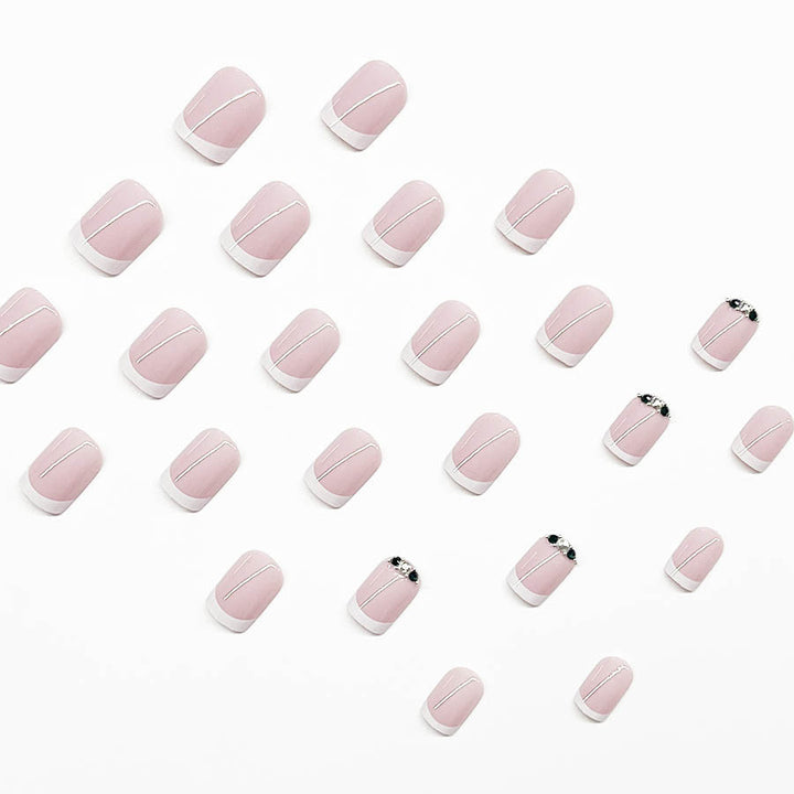 Art nail set with elegant French design and glittering accents Bowlift