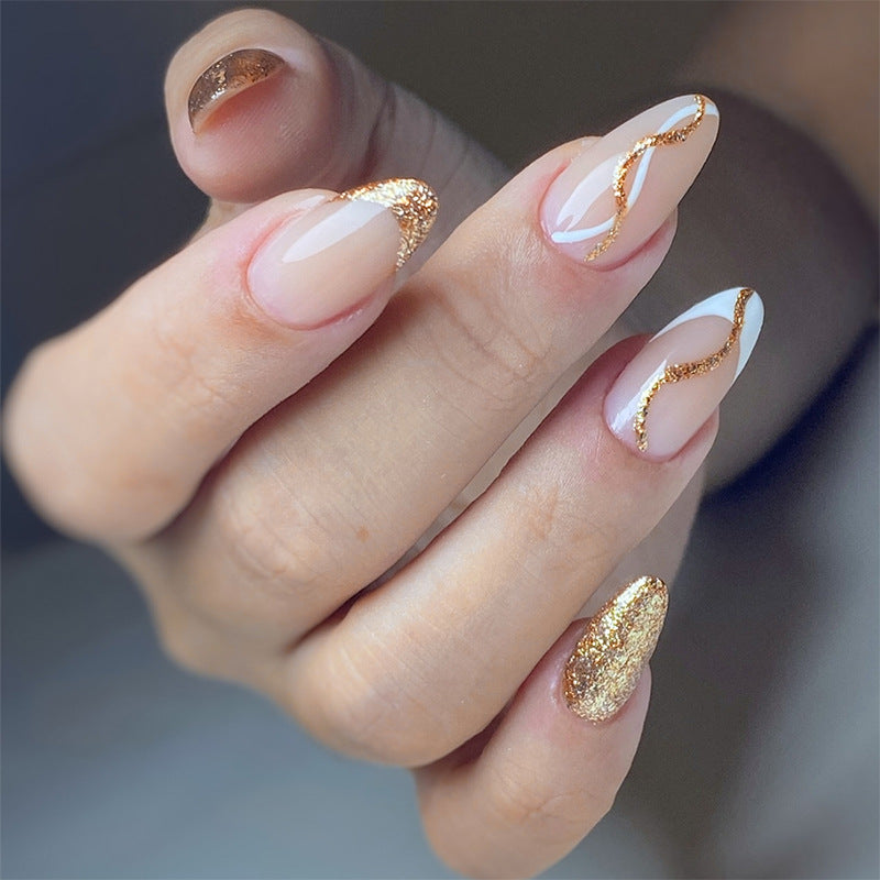 Elegant Press-On Nail Set with Glitter and Gold Swirl Accents Bowlift