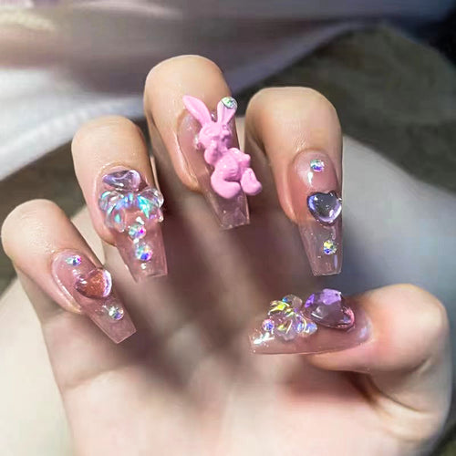 Artificial nail extensions with artistic decorations Bowlift