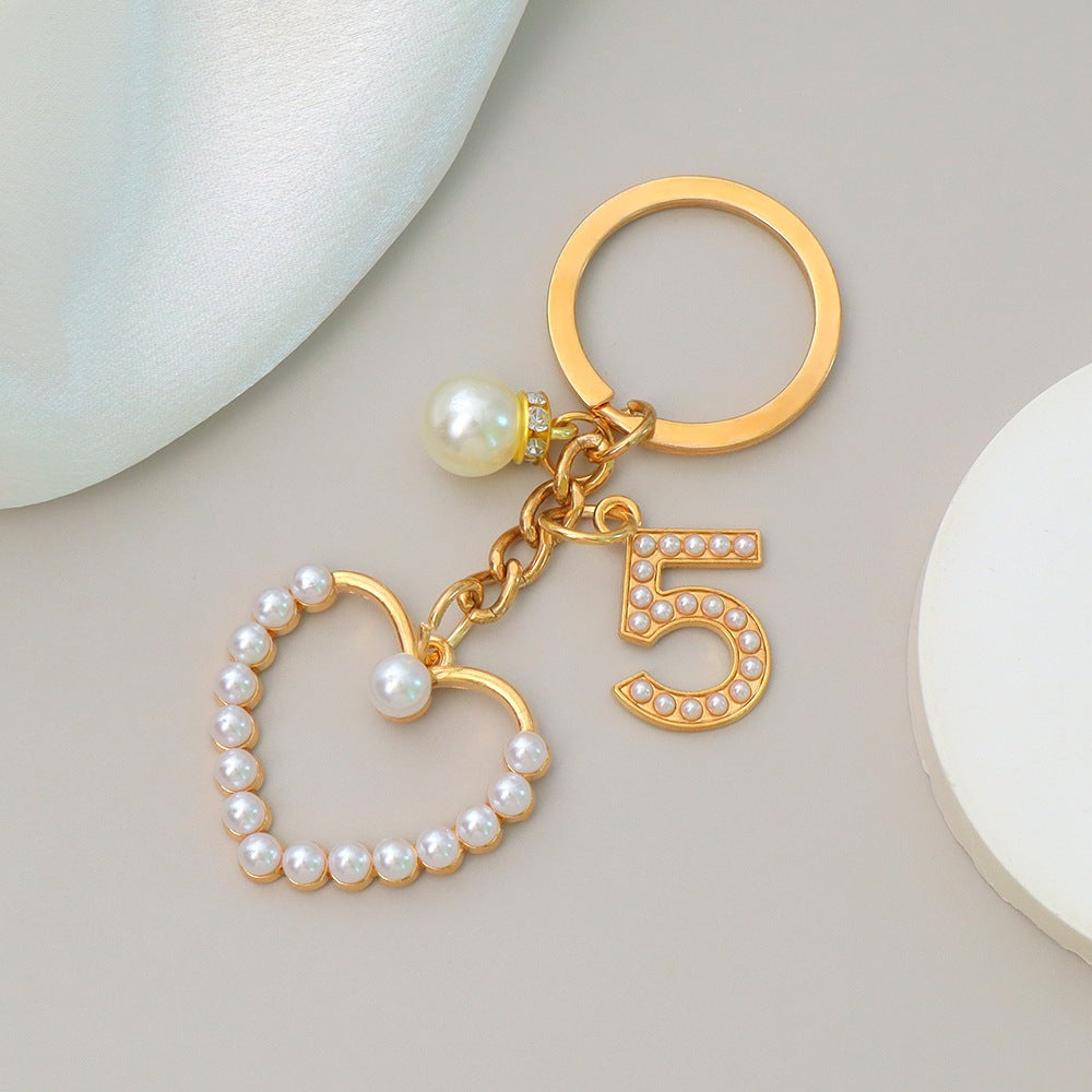 Keychain with heart and flower motif Bowlift
