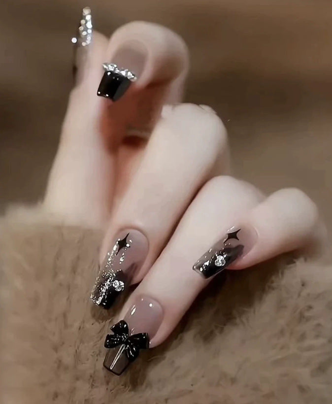 Elegant nail design with pearl embellishment Bowlift