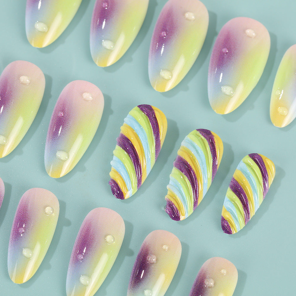Artificial nails with soft ombre colors and creative patterns Bowlift