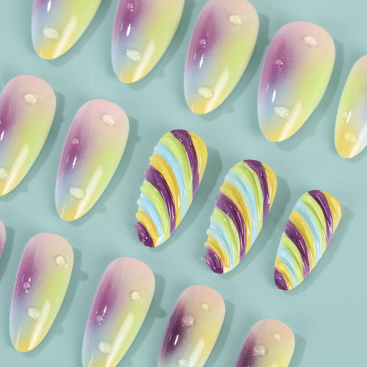 Artificial nails with soft ombre colors and creative patterns Bowlift