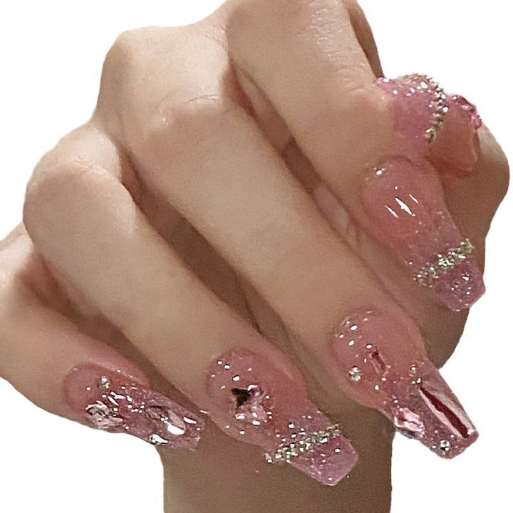 Artificial nails with heart design and glitter accents Bowlift