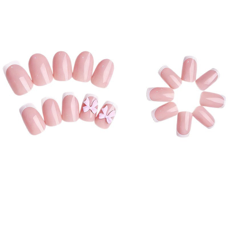 Exclusive artificial nails with decorative bows and pearl details Bowlift