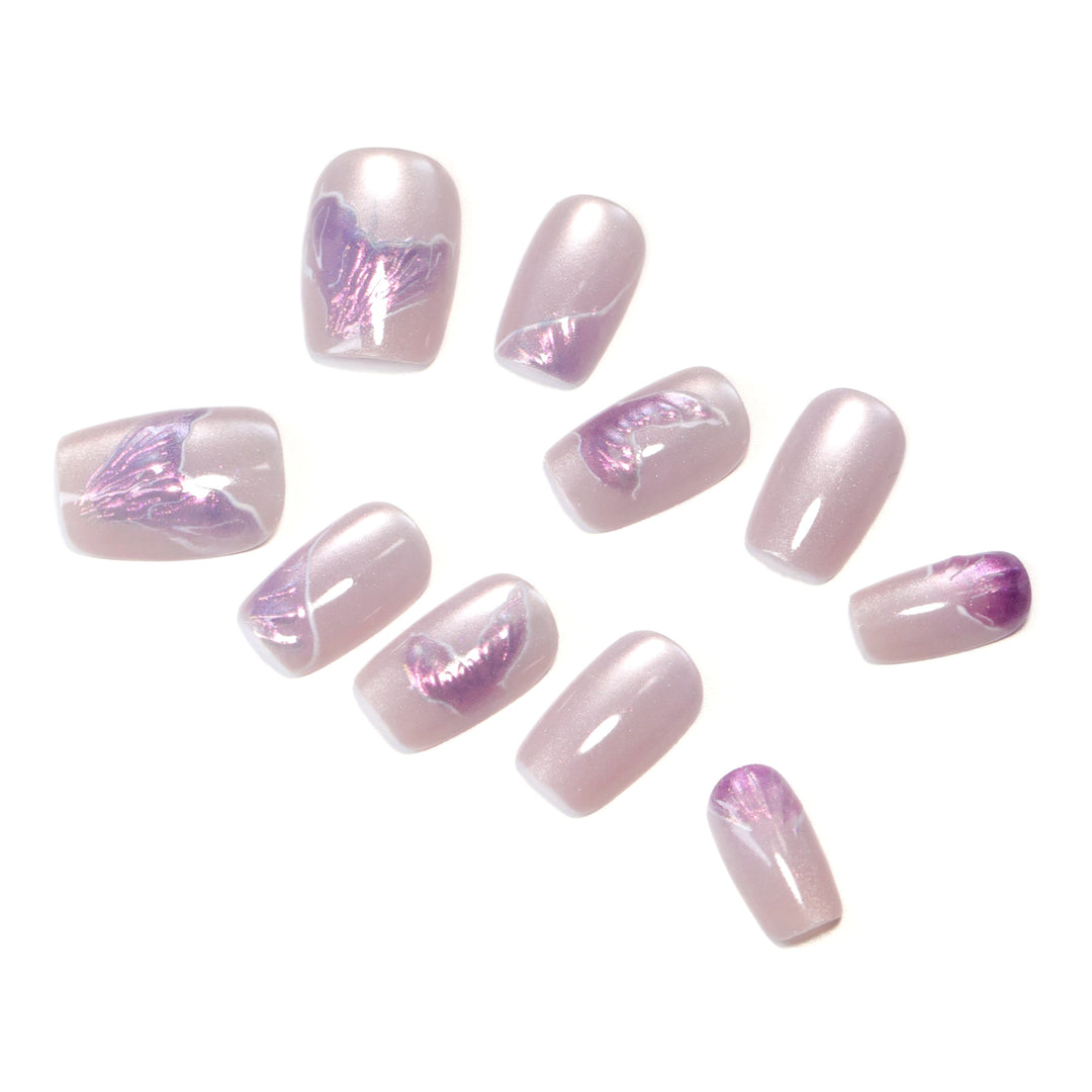 Artfully designed nail extensions with elegant flower motifs Bowlift